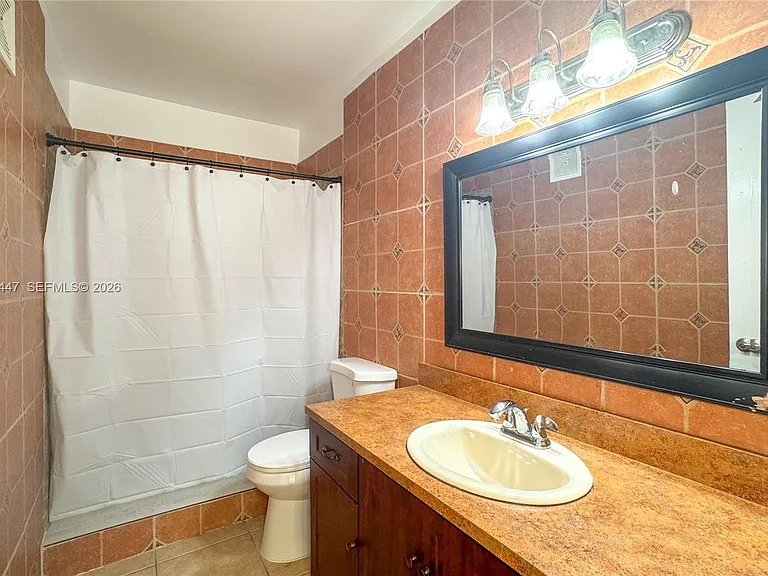13898 SW 90th Ave #204 — Photo 31