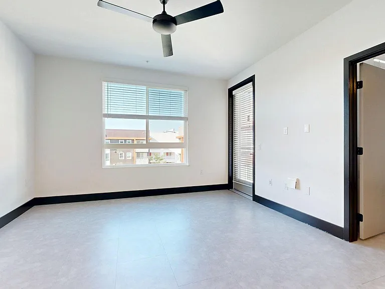 Apartment Living Room with Wood-Style Flooring and Patio/Balcony.
