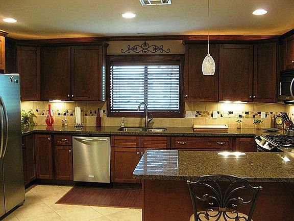 Kitchen is all stainless and granite with custom cabinets!