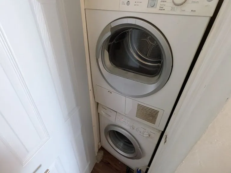 Washer and dryer inside the unit
