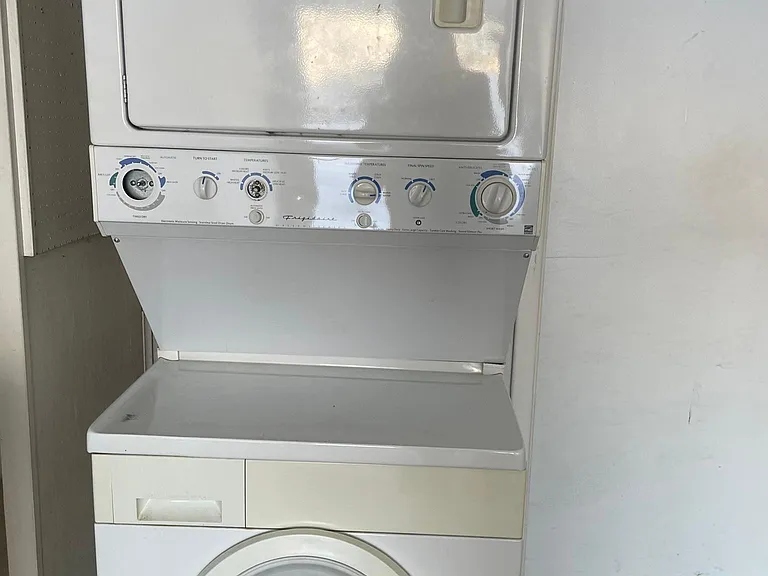 Washer and dryer in the Garage next to kitchen entrance.