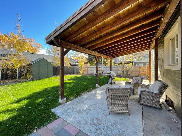 HUGE fully fenced in backyard, gas grill, patio set, covered patio, sprinkler system, weekly mowing included with rent.
