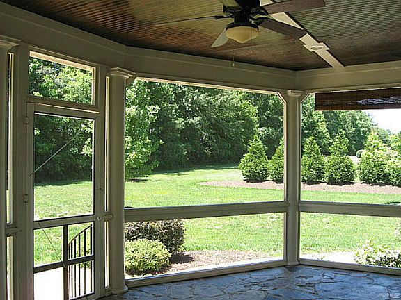 Enjoy outdoor living on the screened porch AND the patio! Perfect for BBQ'g, entertaining or just relaxing!