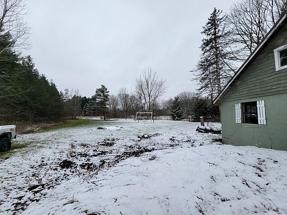 Back yard view from east side of garage