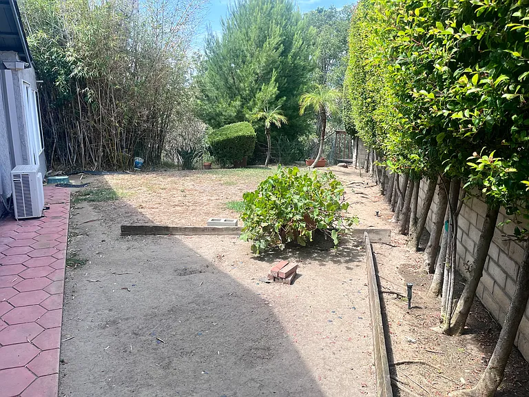 Side Yard Facing Towards Canyon