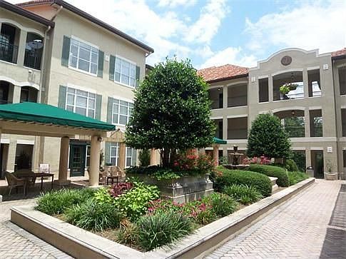 The Italian-style courtyard welcomes you home!