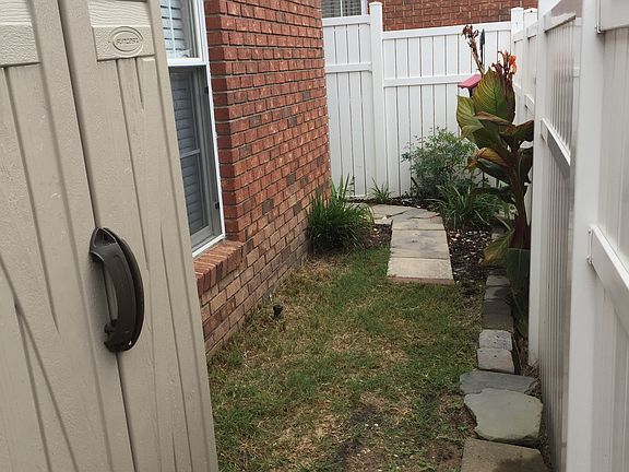 Back yard with storage unit