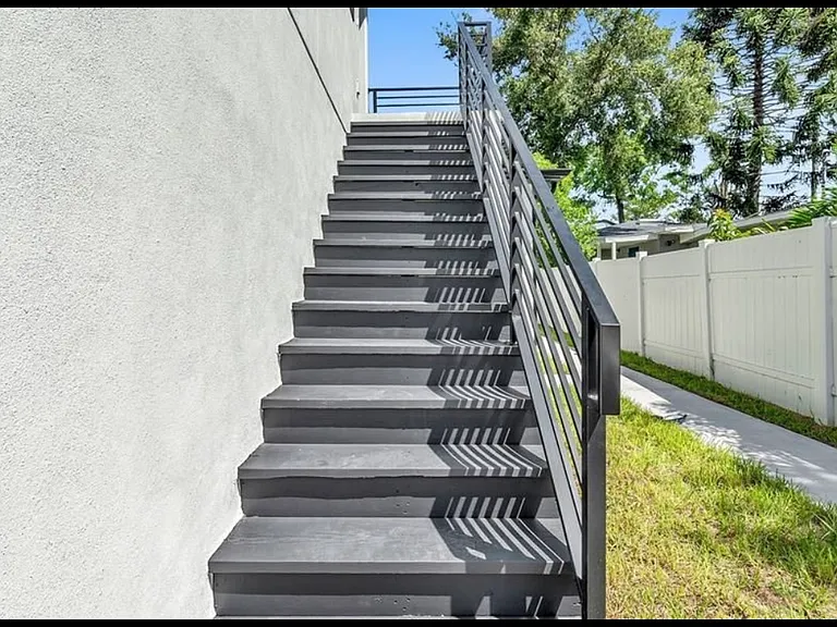 Steps up to the apartment.