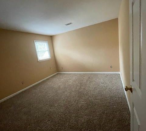Bedroom 2- upper level. Bedrooms 2 and 3 share a bathroom in the hallway.