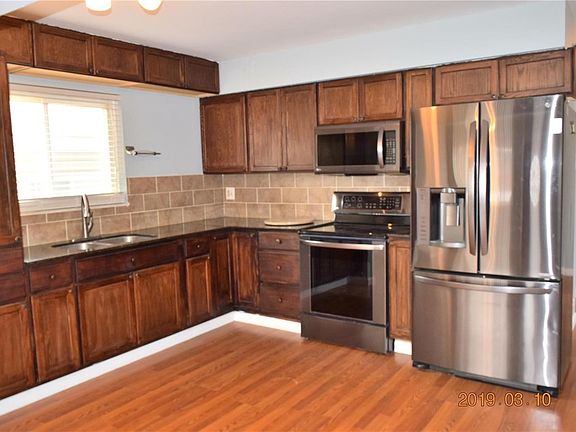 Lots of cabinets in this kitchen.