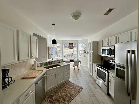 Fully appointed kitchen, with dishes, glassware, utensils, cookware, and accessories.