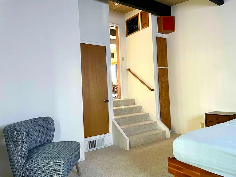 'Sunken' bedroom - spacious area with king size bed and small desk