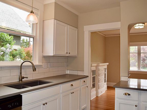 Fully Remodeled Kitchen including new cabinets, quartz counters, and new appliances including dishwasher