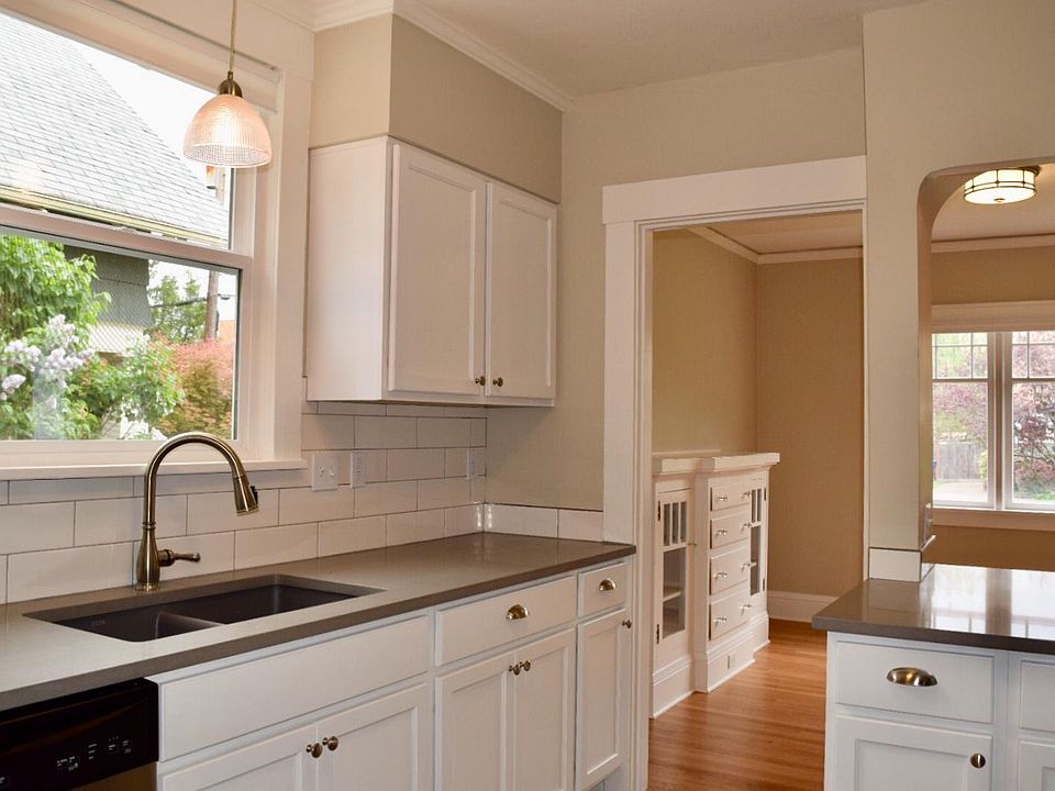 Fully Remodeled Kitchen including updated cabinets, quartz counters, and stainless steel appliances