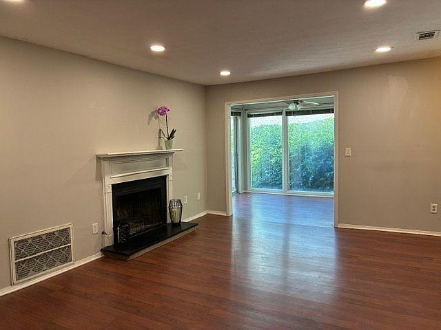 Livingroom with Hardwood floors and sunroom