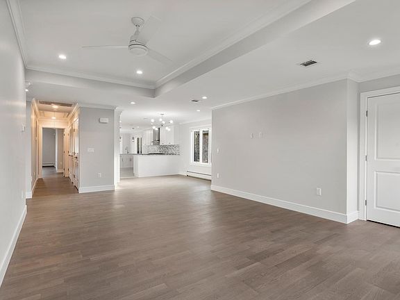 Huge Livingroom with beautiful floors throughout