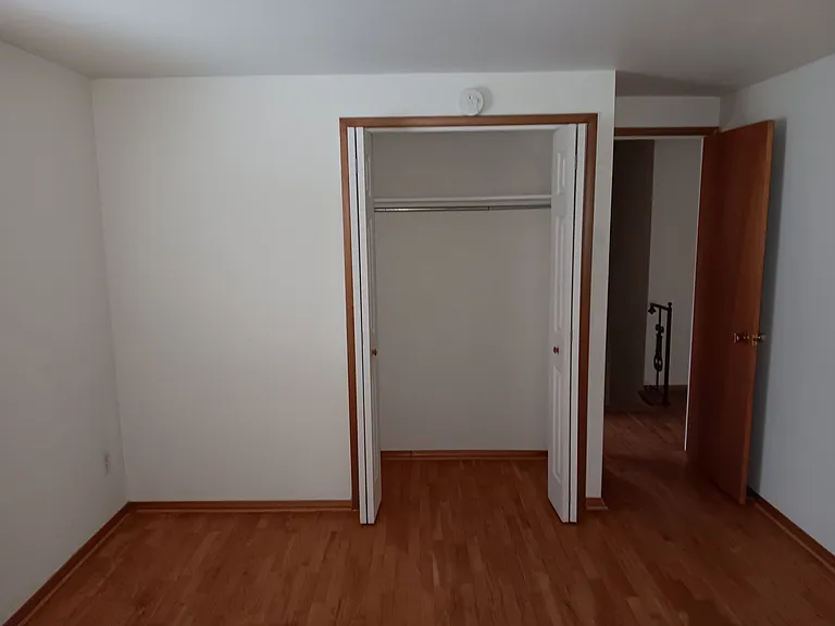 Good size second bed room upstairs. Closet, smoke detector, LED lights.
