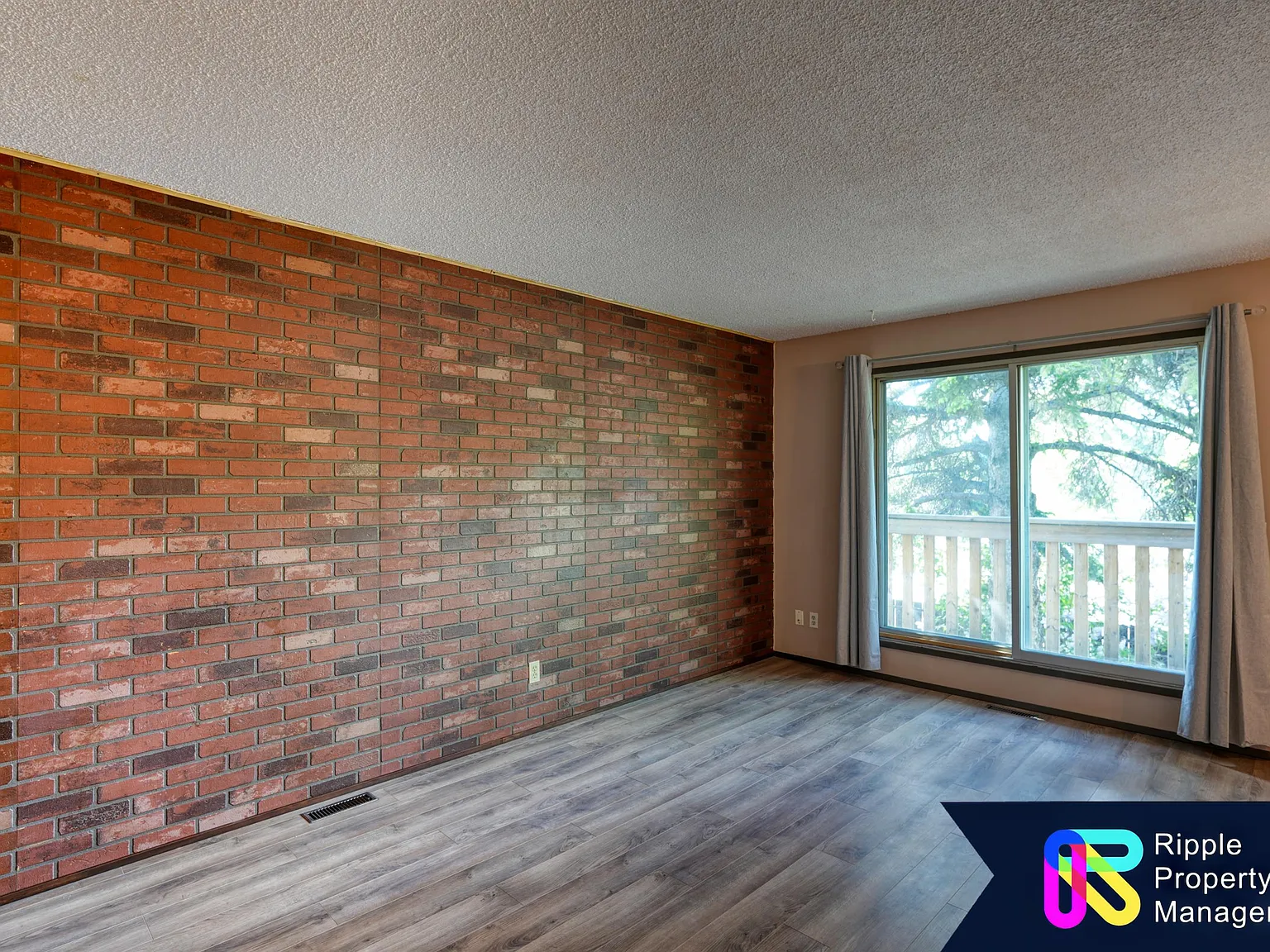 7712 Bowness Road NW (5-plex), Calgary - Unit C — Photo 2