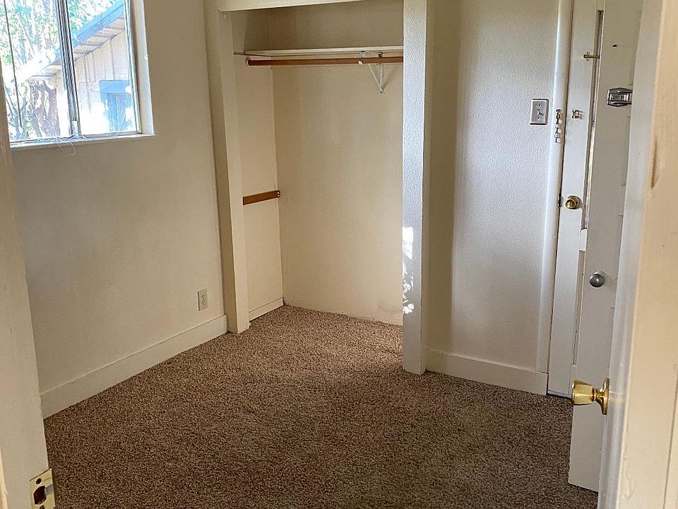 bedroom with new carpet and spacious closet