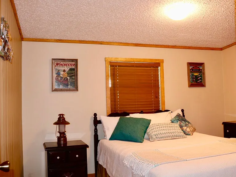Bedroom 1 has a separate entrance and direct access to the large utility room and back patio