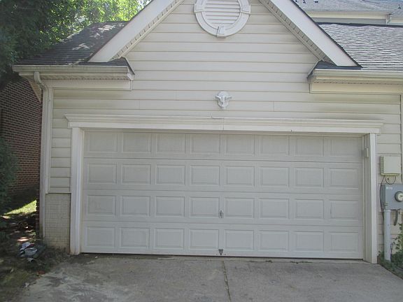 A pleasant surprise and a delightful two car detached garage with entrance from the back.