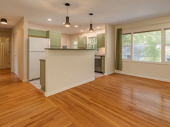 Kitchen and Dining Areas (bar height counter with space for 2-3 stools and plenty of space for a dining table & chairs)
