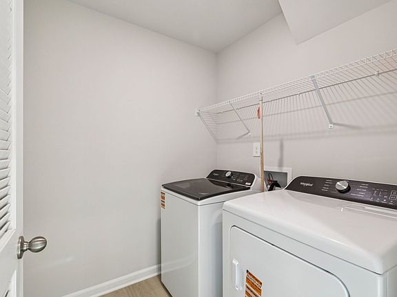 Laundry room in the Lennon floorplan at a Meritage Homes community in Garner, NC.