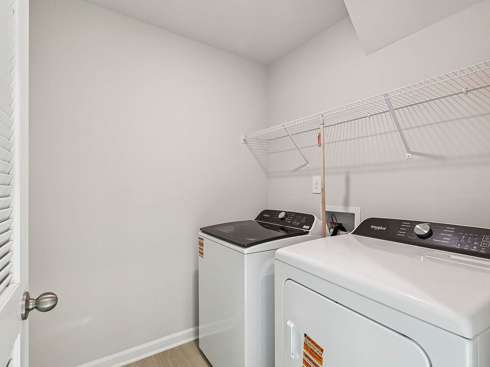 Laundry room in the Lennon floorplan at a Meritage Homes community in Garner, NC.