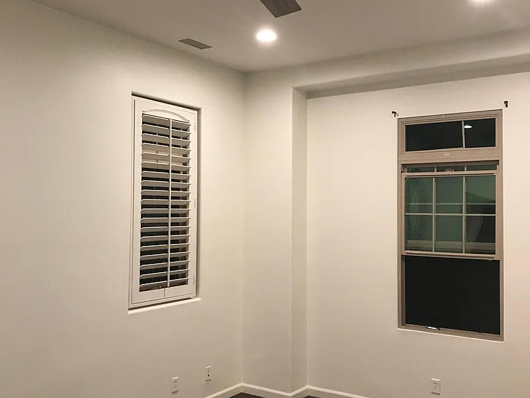 Master bedroom with new ceiling fan