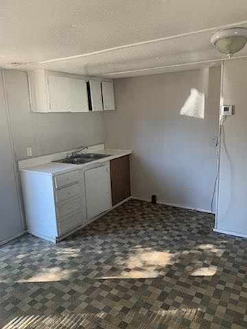 Studio Area with a sink. Refrigerator will be installed if you do not have one.