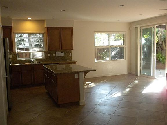 Combined kitchen, dining nook, and family room