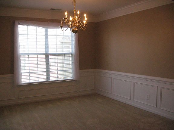 Formal Dining Room with wainscoting