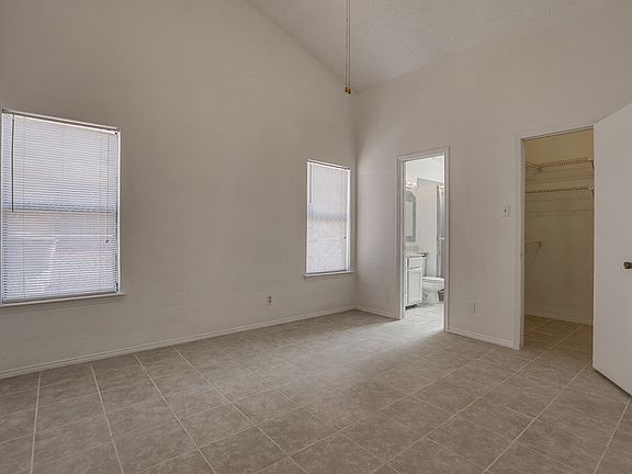 Master bedroom. It offers new flooring, a walk-in closet an