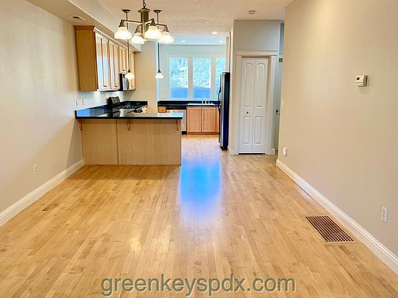 Laminate flooring in dining area and kitchen