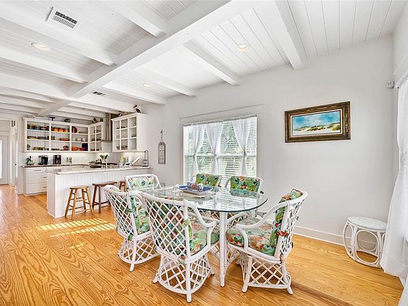 Dining area with eat-in kitchen nearby