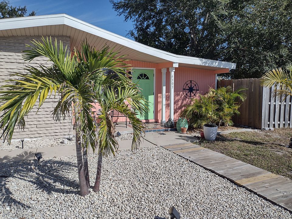 Curb appeal. Huge corner lot with fenced yard.
