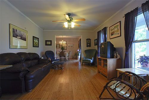 Formal living room overlooking front yard and hills.