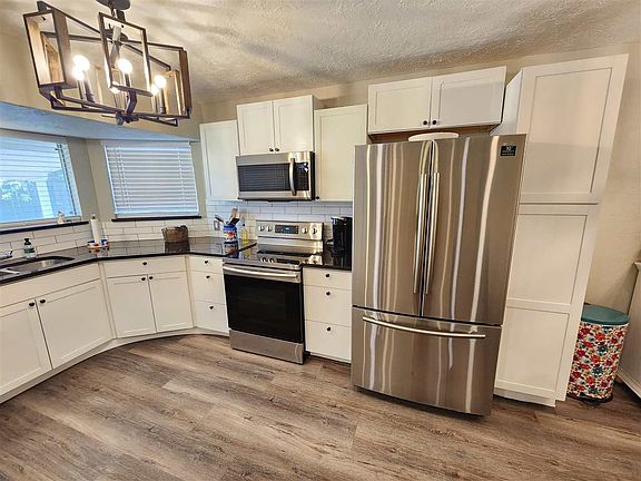 5th image of 5308 NW Rotherwood Dr