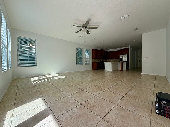Open living room, dining room, and kitchen space