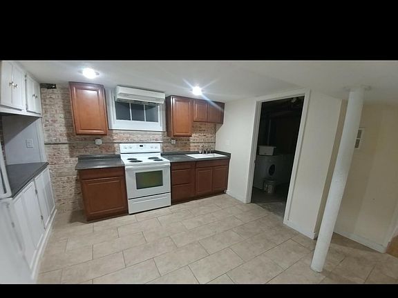 Kitchen w/ separate laundry room
