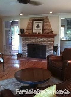 Kitchen
						:
						Sub Zero Fridge and Wolf Dual Fuel Range, oak floors, exposed Brick Chimney