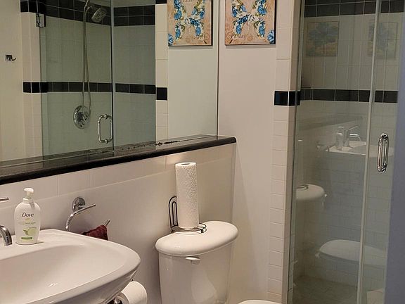 Bathroom. Walk in closet with washer & dryer.