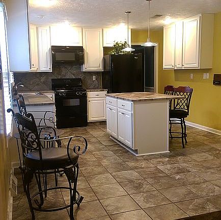 Step up to Kitchen from Den 