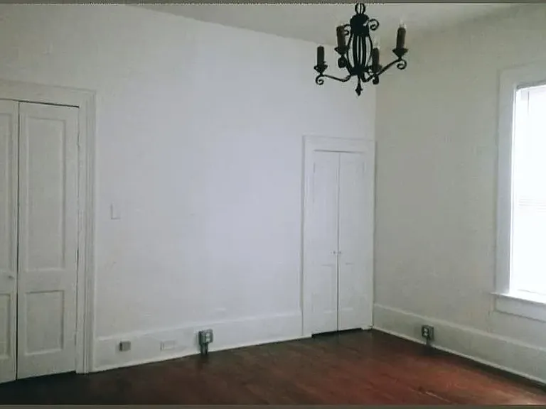 Master bedroom. Doors in corner lead to closet. Doors on the left are part of the wall and do not open