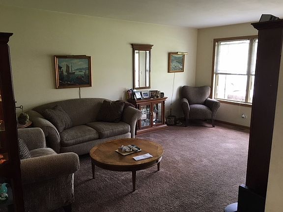 2nd image of 10311 W Ames Ave