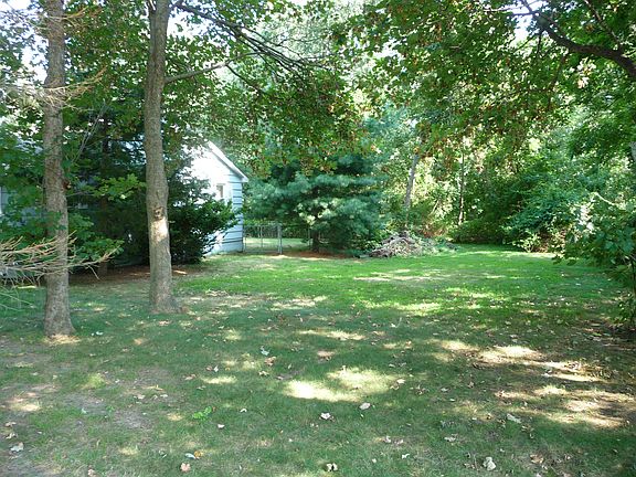 Empty side lot next to house