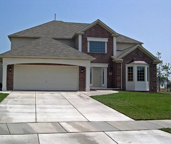 Exterior - Brick and Vinyl 