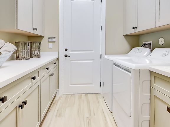 Laundry room with cabinet space
