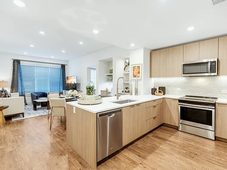 Gourmet chef kitchens with minimalist Italian cabinets with soft-close drawers, and premium granite countertops
