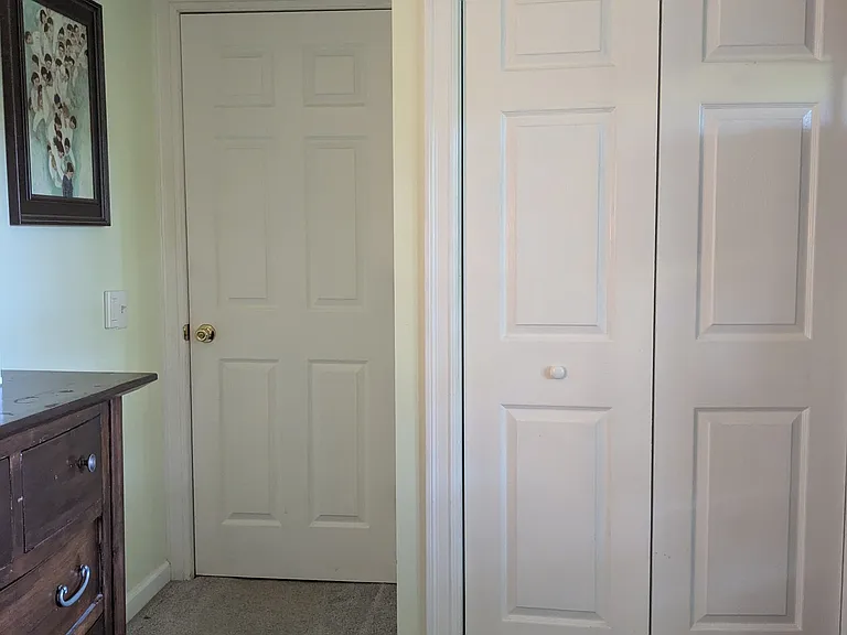 Bedroom 1 facing north, primary exit faces to hallway